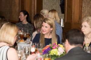 People enjoying dinner at the awards presentation