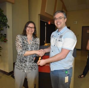 Frederic Chevalier receiving award