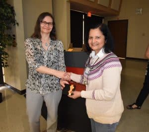 Shalini Nair receiving award