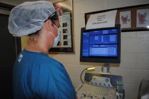 Laurie Condel at an ultrasound machine