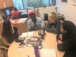 Researchers around a table