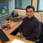 Dr Huang in his office