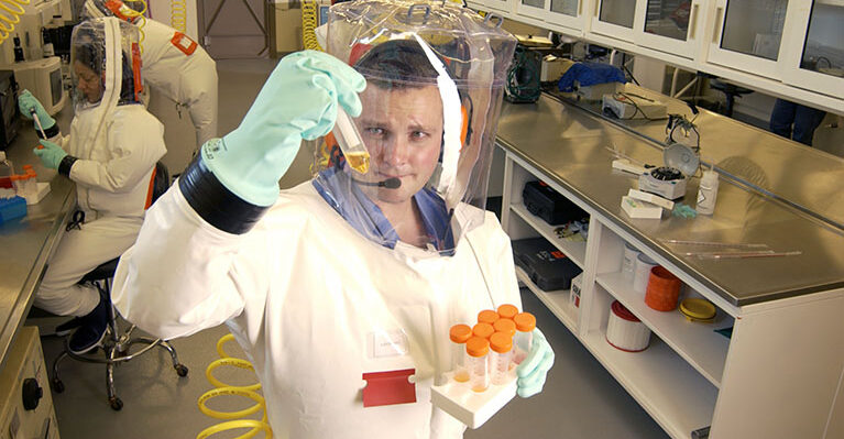 Dr. Hayhurst in the BSL4 lab